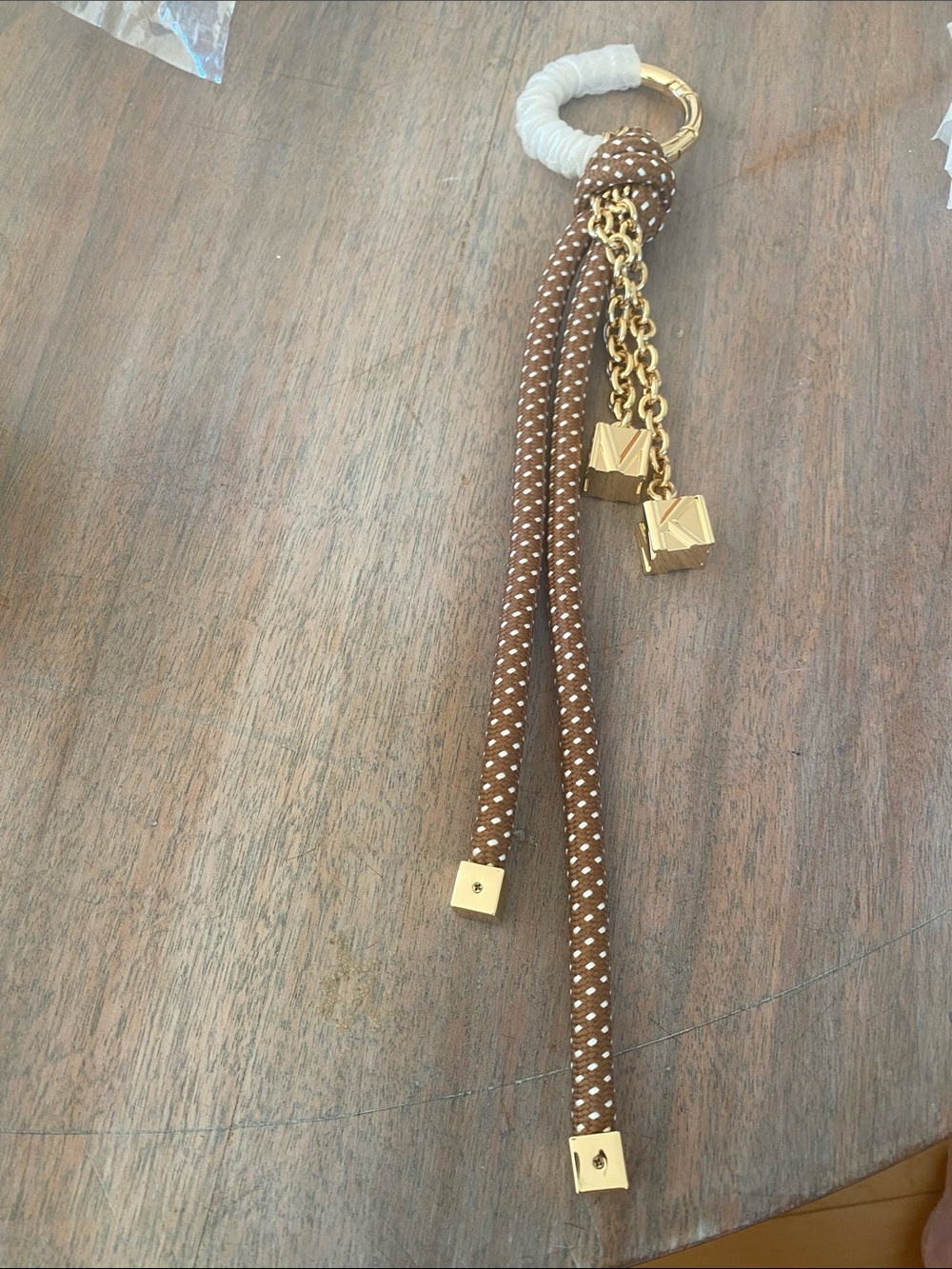 Michael Kors Brown and Gold Rope Tassel Keychain